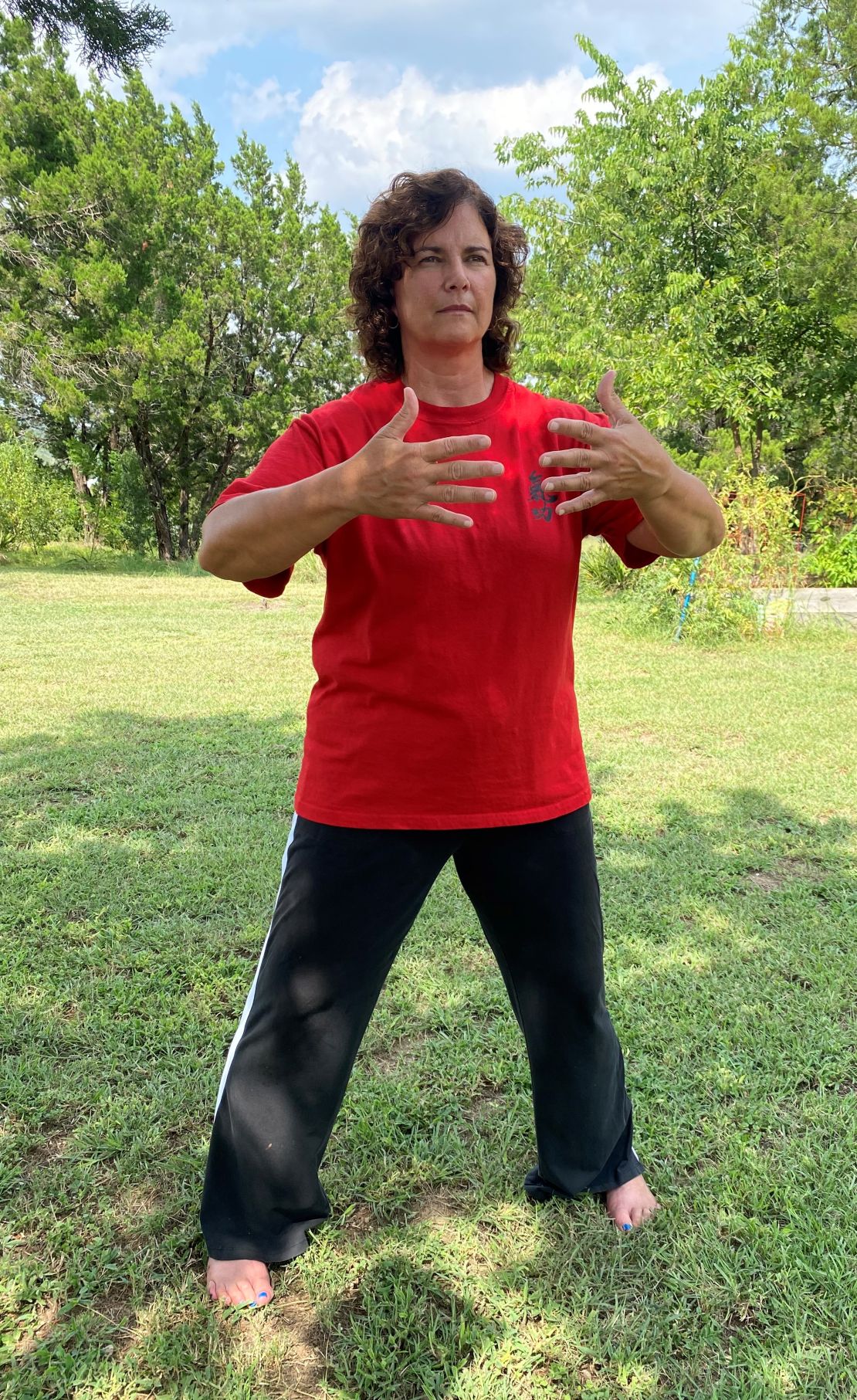 Karen doing Zhan Zhuang Standing Qigong